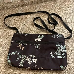 Dakine black floral Jacky crossbody bag with zippered pockets NWOT